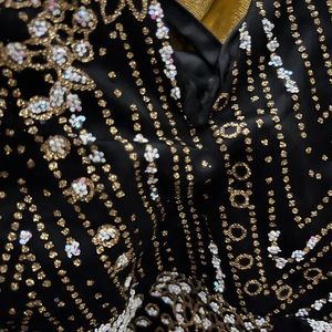 Gorgeous Embellished Sequins mini dress with laced-up back. Simply gorgeous!!